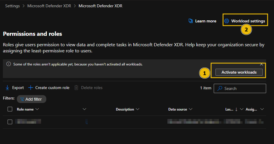 Microsoft Defender XDR Permissions and roles screen highlighting "Workload settings" and "Activate workloads"
